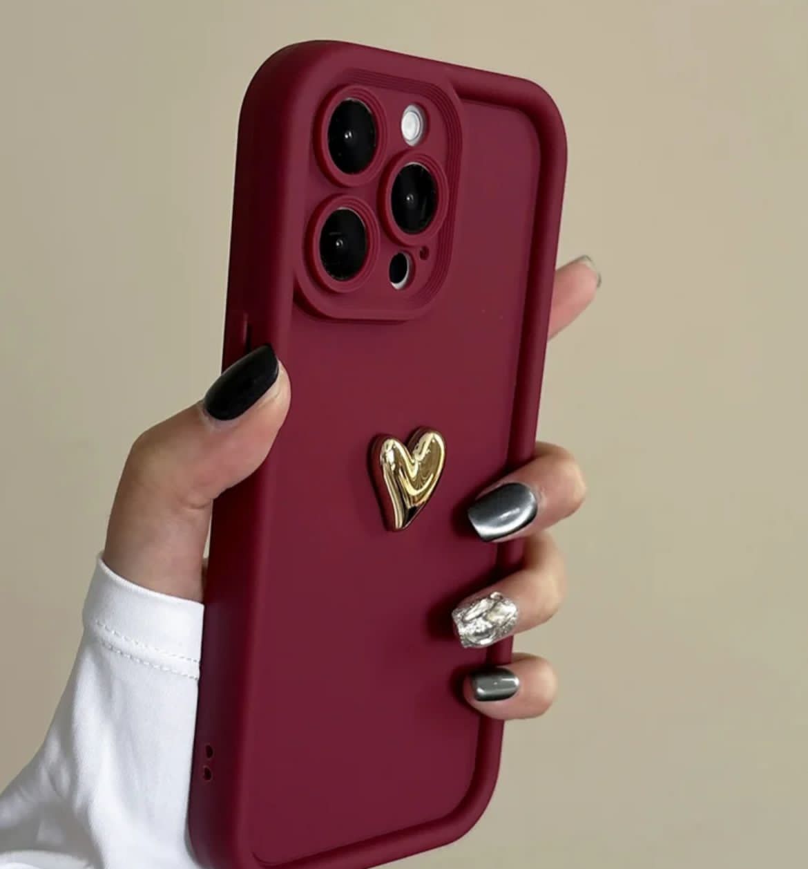 Maroon case with gold heart